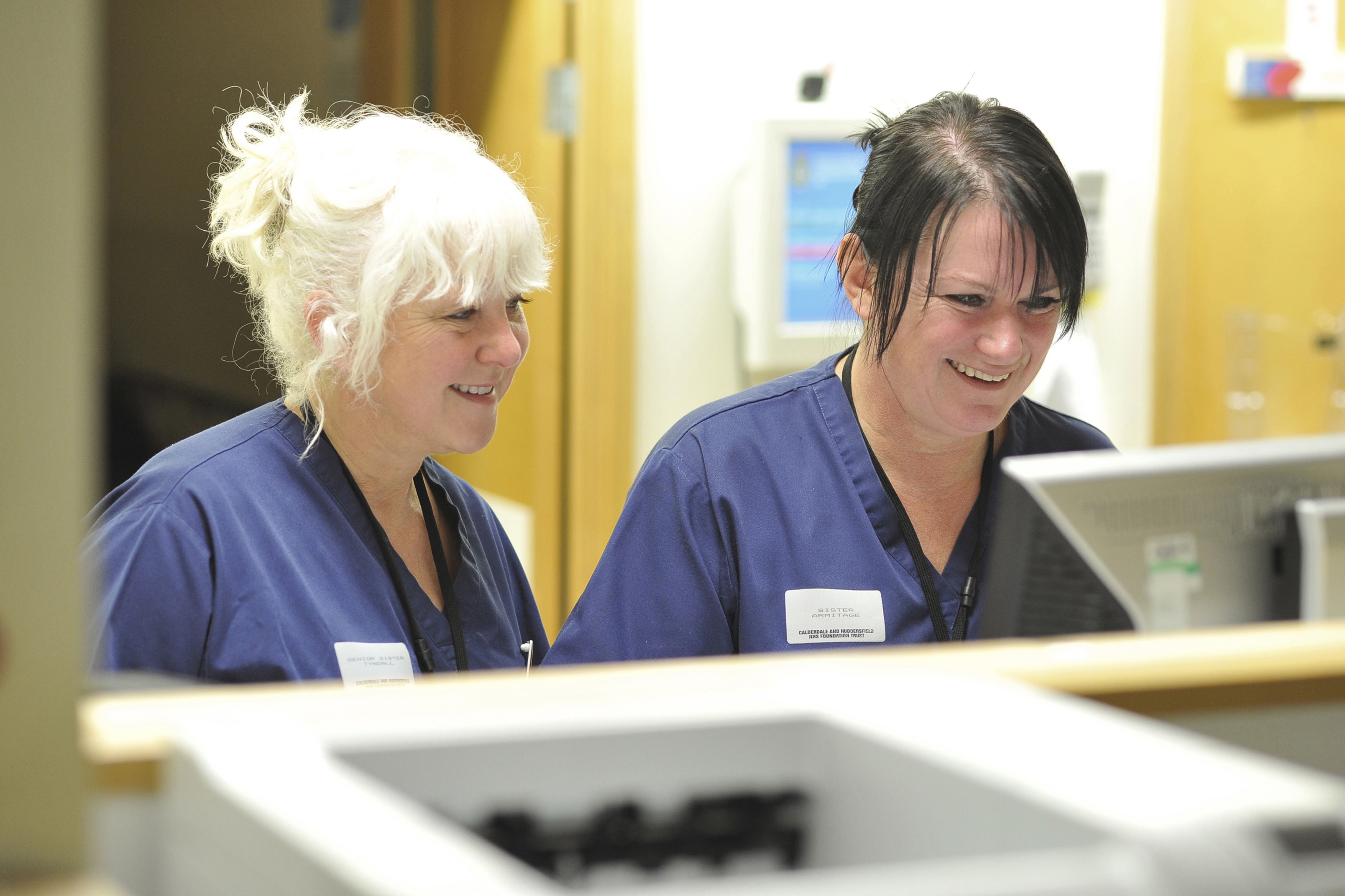 header image of two nurses working